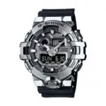Casio G-Shock wristwatch with a brushed metal bezel and black strap, displaying time and date digitally and analog-style hands