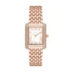 Rose gold Michael Kors rectangular watch with crystal-studded bezel, white dial, Roman numeral markers, and a linked bracelet.